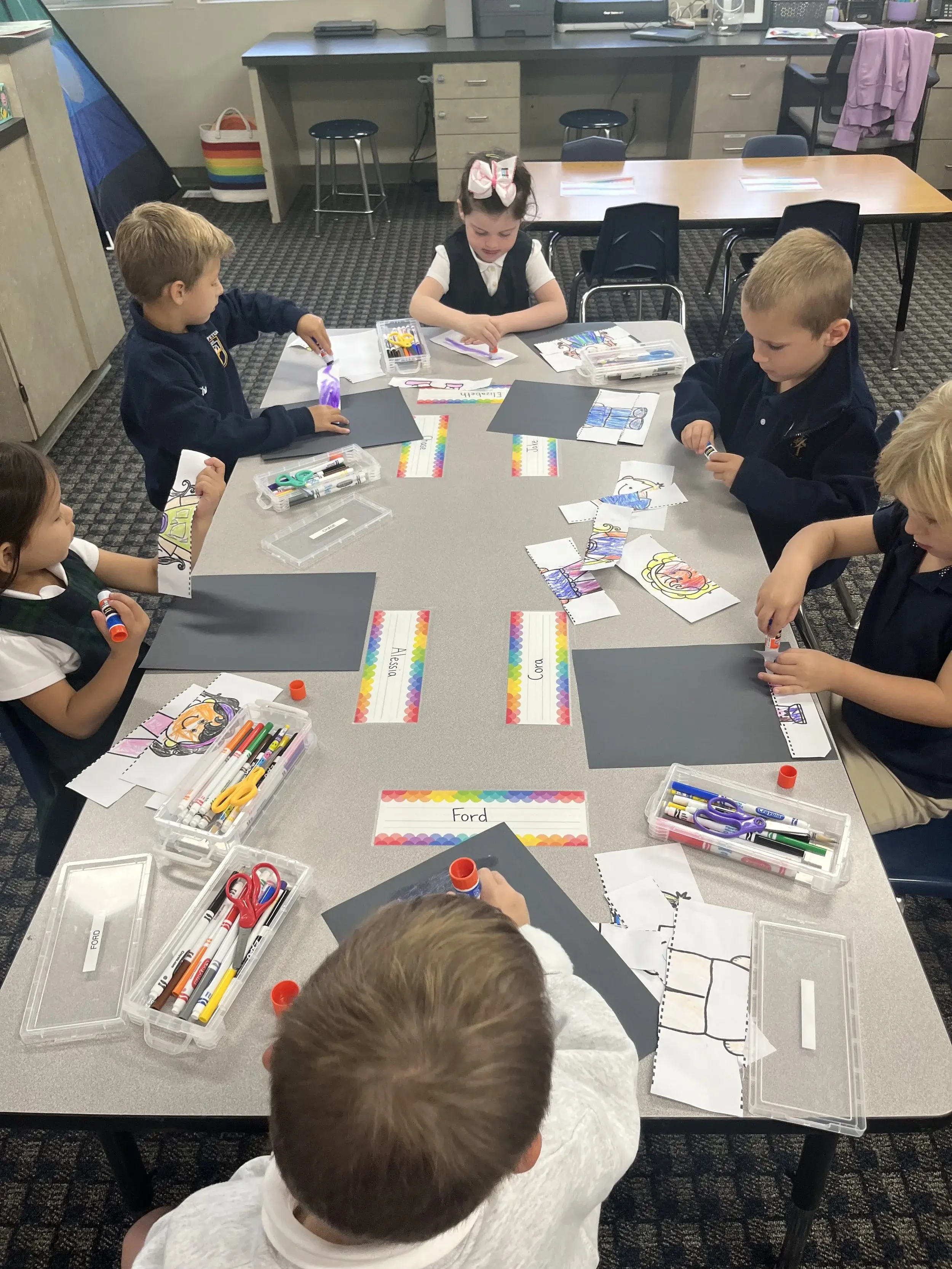 Elementary students collaborating on hands-on learning at St. Perpetua